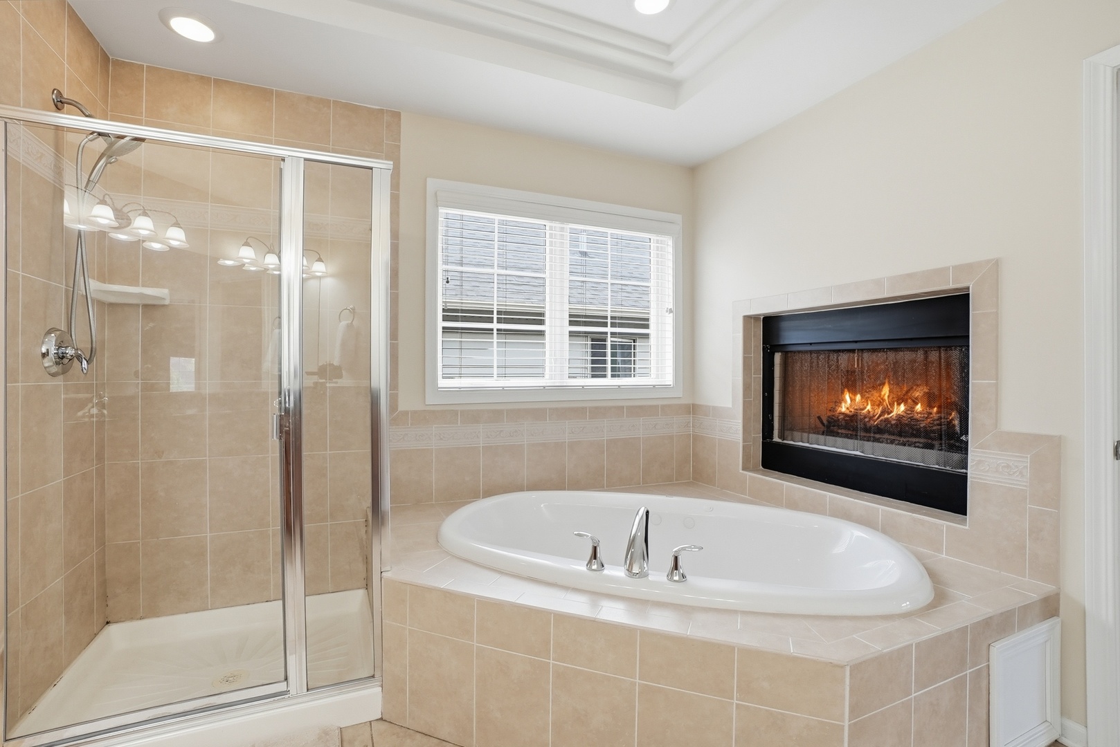 S635 Robbins Street Winfield, IL 60190 - Photo 14 of 35 a bath tub sitting next to a window