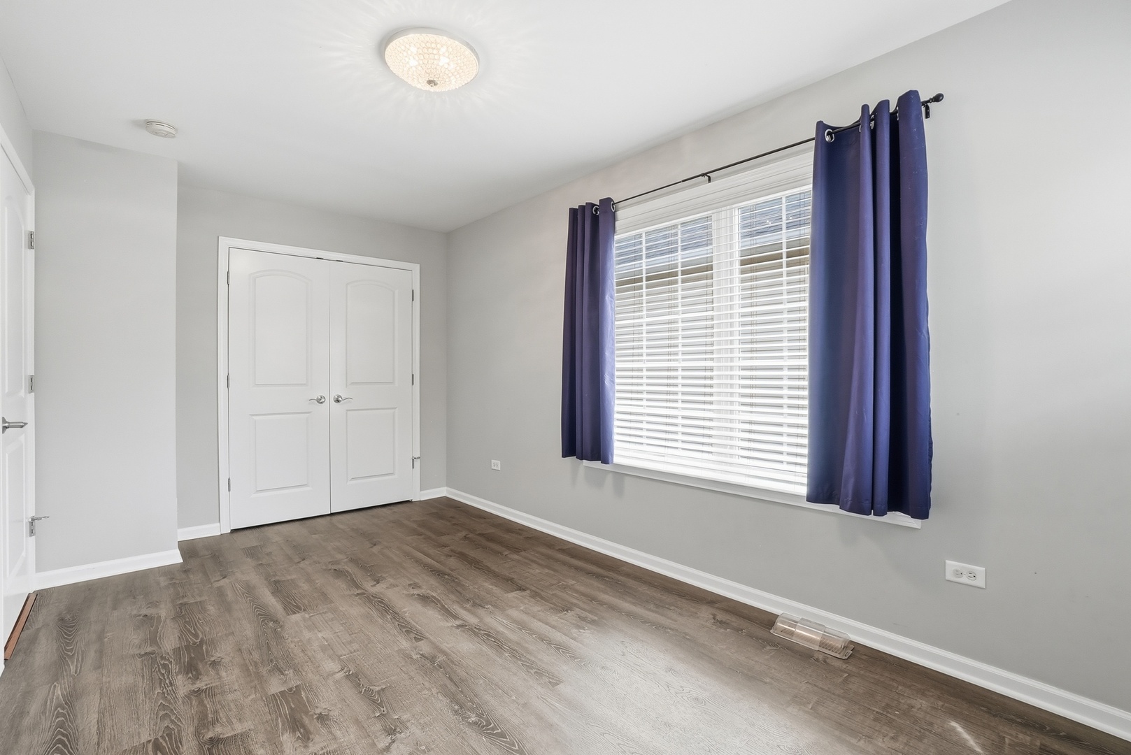 S635 Robbins Street Winfield, IL 60190 - Photo 18 of 35 a view of an empty room with a window