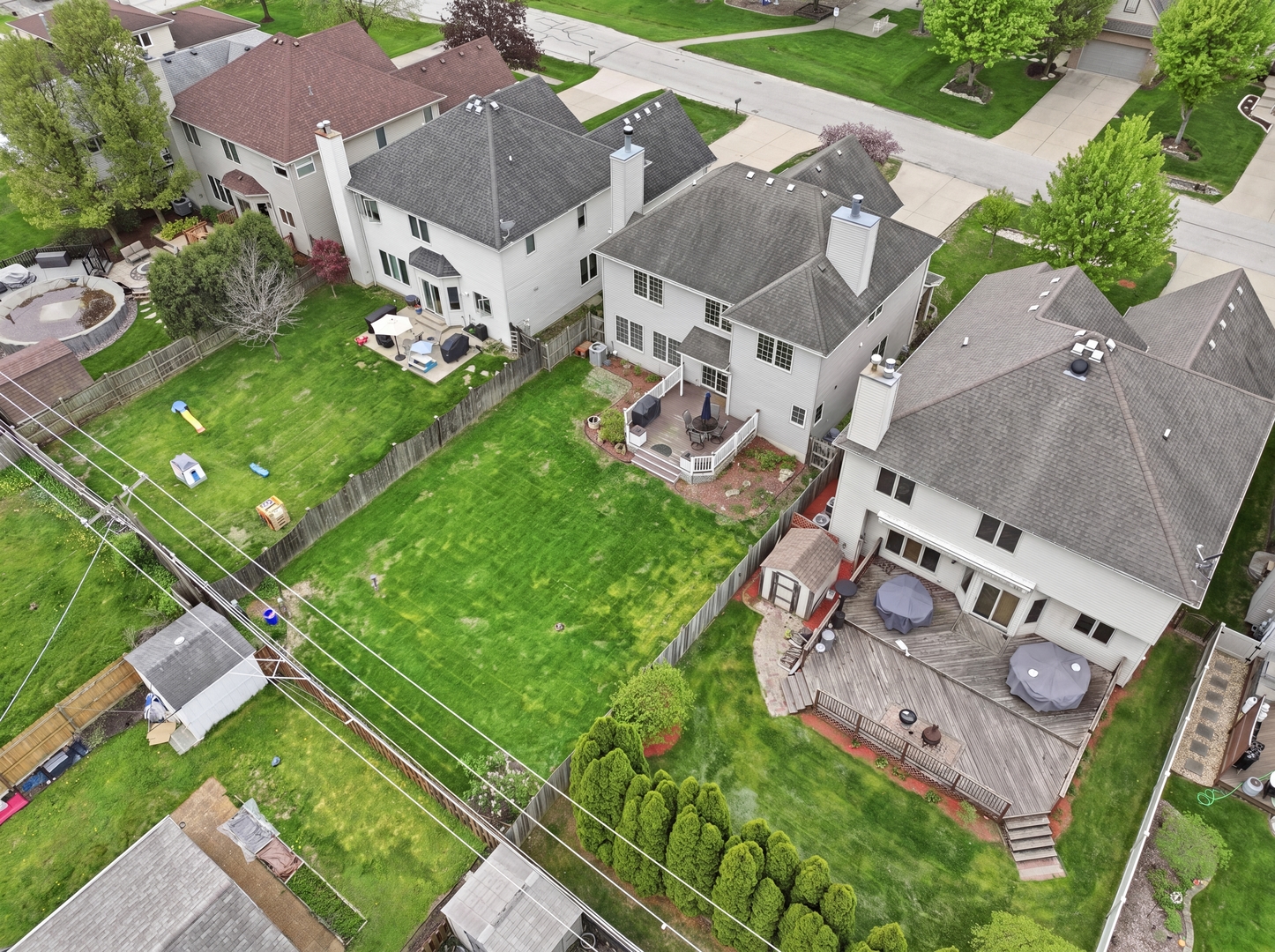 S635 Robbins Street Winfield, IL 60190 - Photo 28 of 35 an aerial view of a house with a garden
