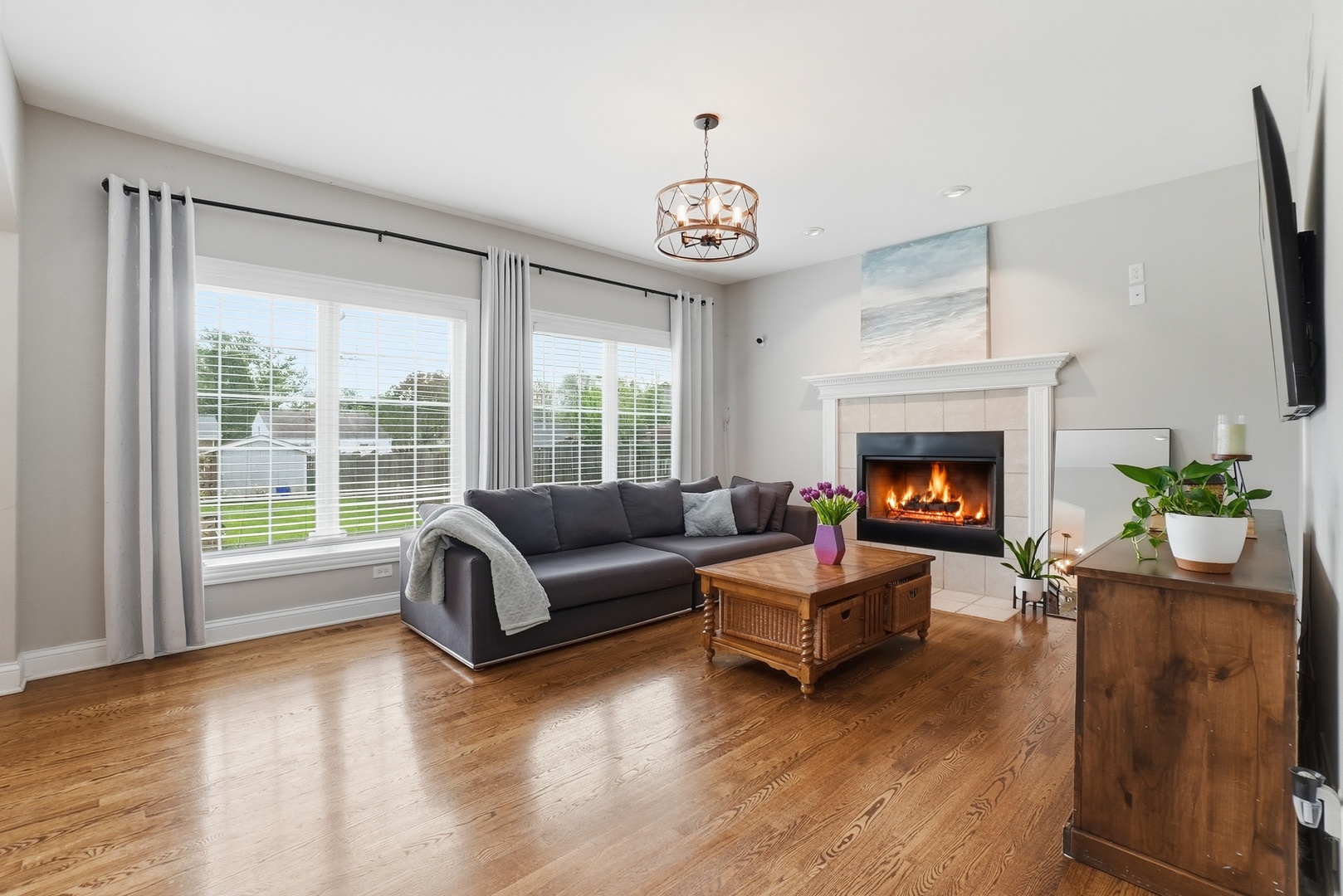 S635 Robbins Street Winfield, IL 60190 - Photo 7 of 35 a living room with furniture and a fireplace