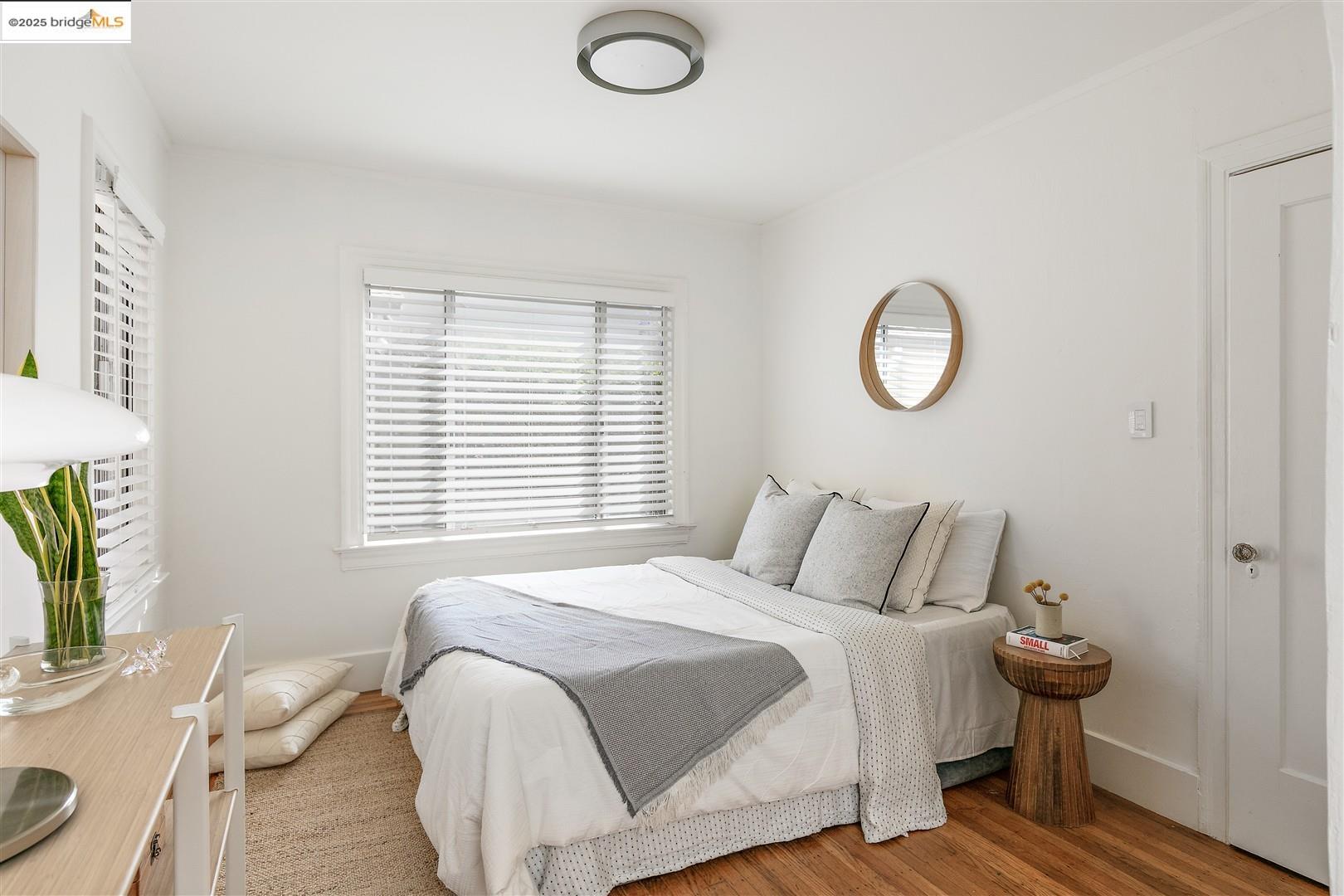 2201-2203 Spaulding Avenue Berkeley, CA 94703 - Photo 20 of 56 Bedroom featuring wood finished floors and baseboards