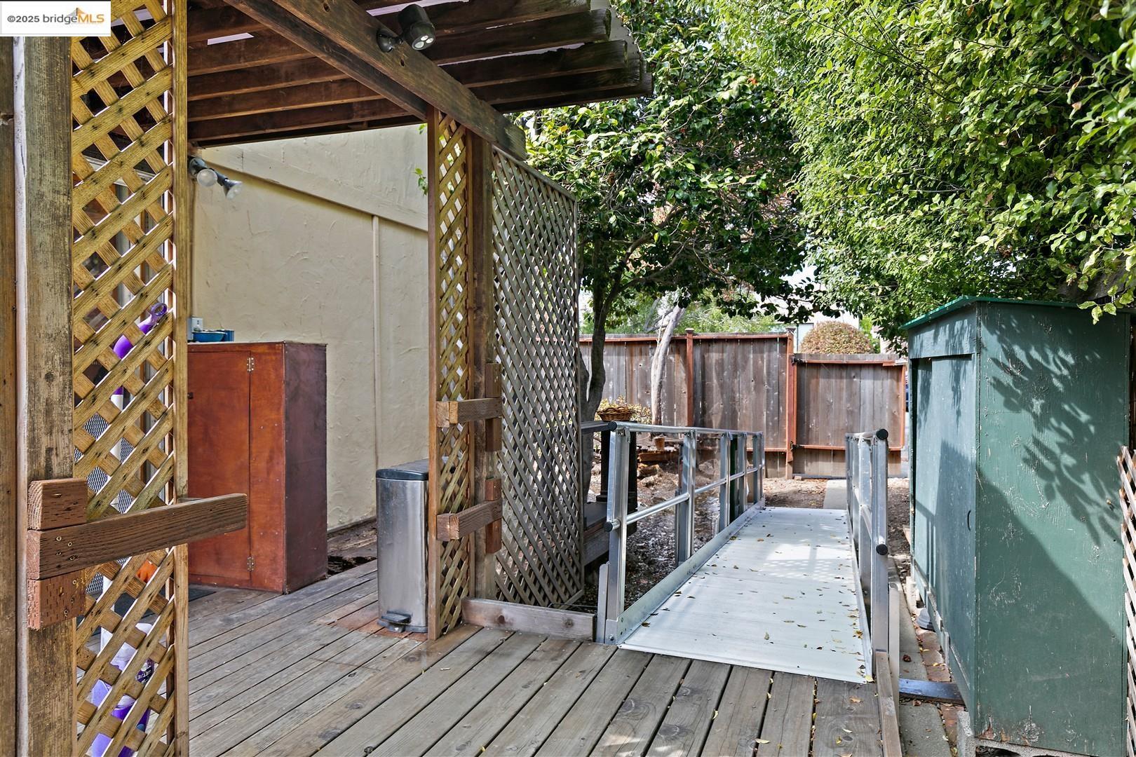2201-2203 Spaulding Avenue Berkeley, CA 94703 - Photo 24 of 56 Wooden terrace featuring a storage shed