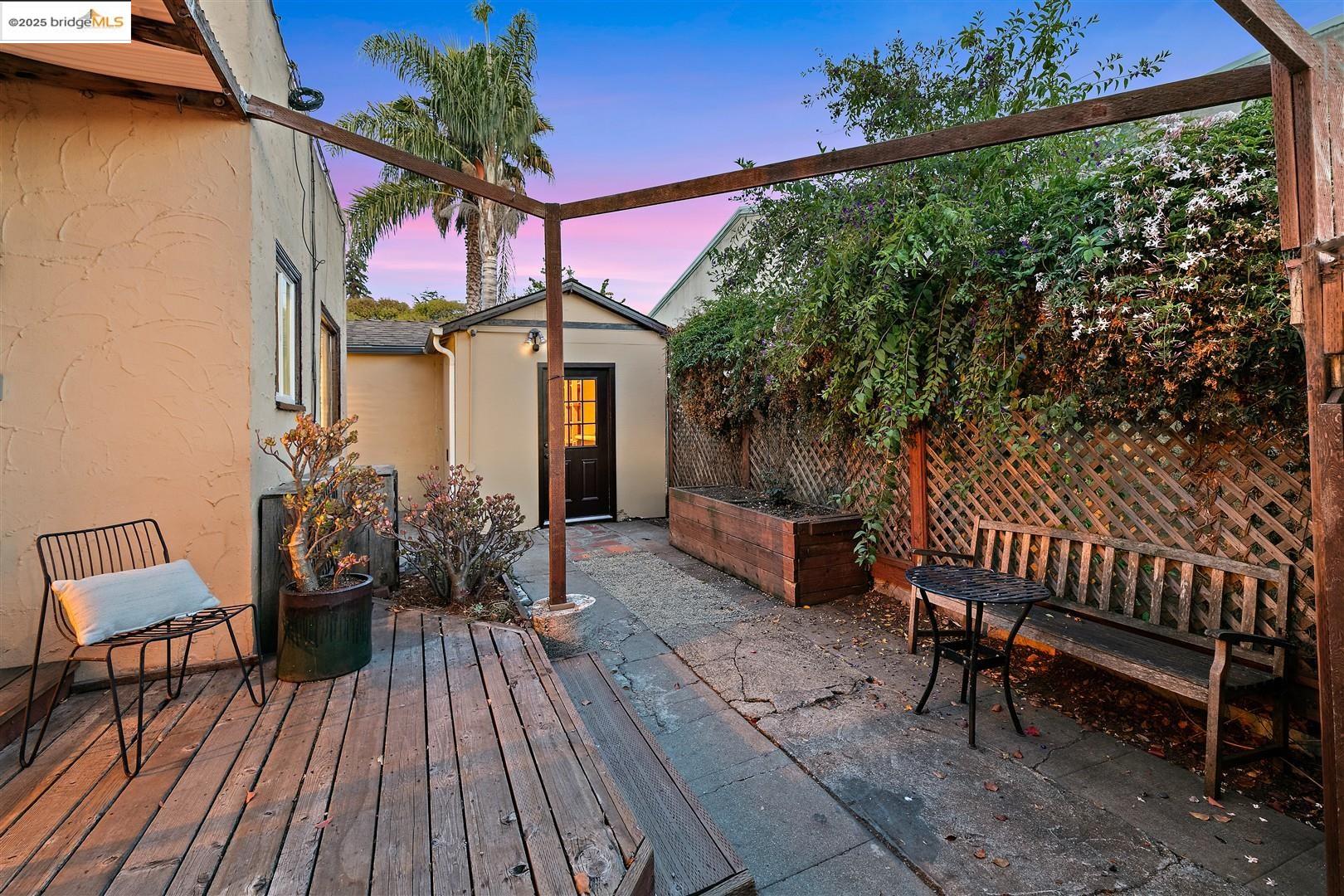2201-2203 Spaulding Avenue Berkeley, CA 94703 - Photo 29 of 56 Deck at dusk with a patio area