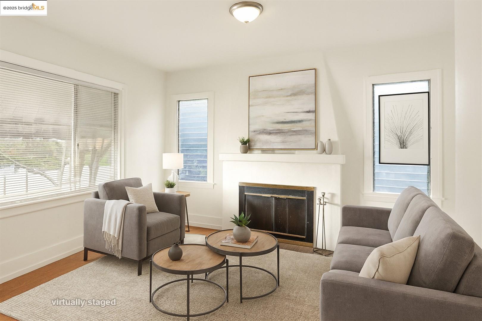 2201-2203 Spaulding Avenue Berkeley, CA 94703 - Photo 38 of 56 Living area with a fireplace with flush hearth and wood finished floors