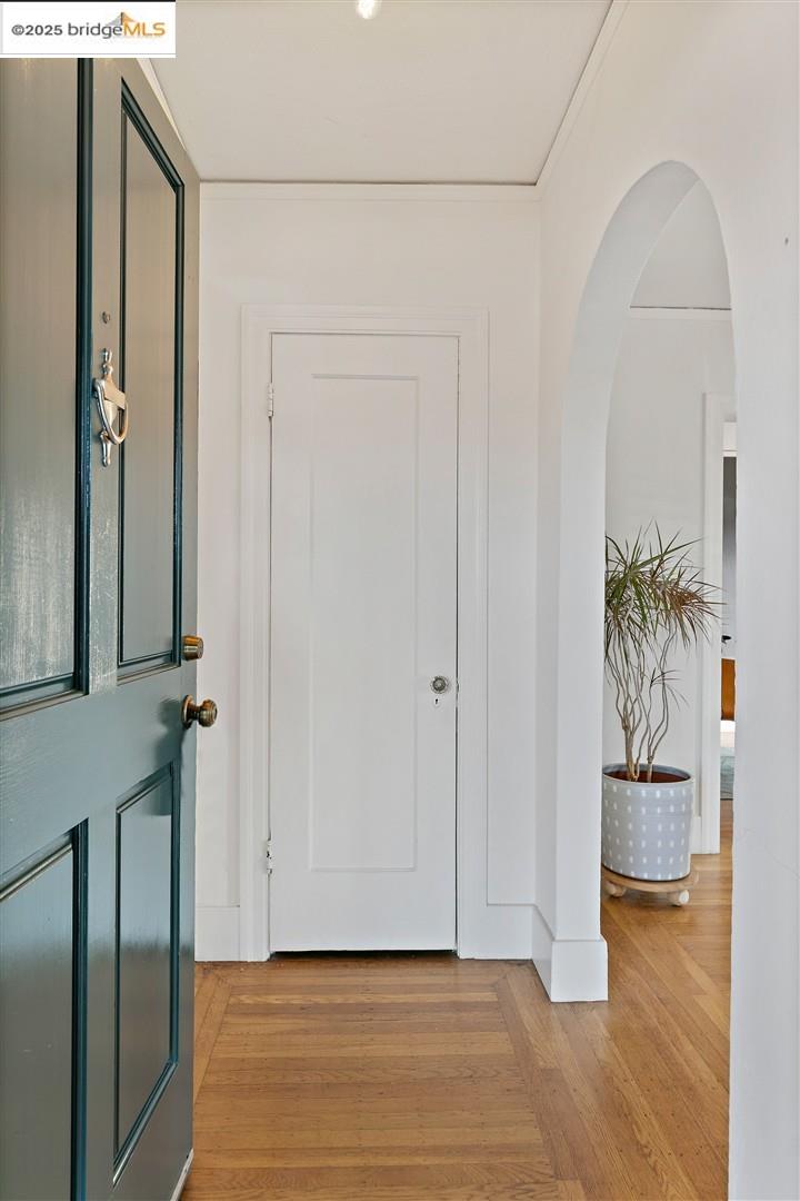2201-2203 Spaulding Avenue Berkeley, CA 94703 - Photo 6 of 56 Foyer entrance with light wood finished floors and arched walkways