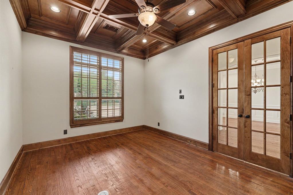 408 Blue Ridge Court Allen, TX 75013 - Photo 20 of 31 Hardwood flooring and a coffered wood-finish ceiling with recessed lighting