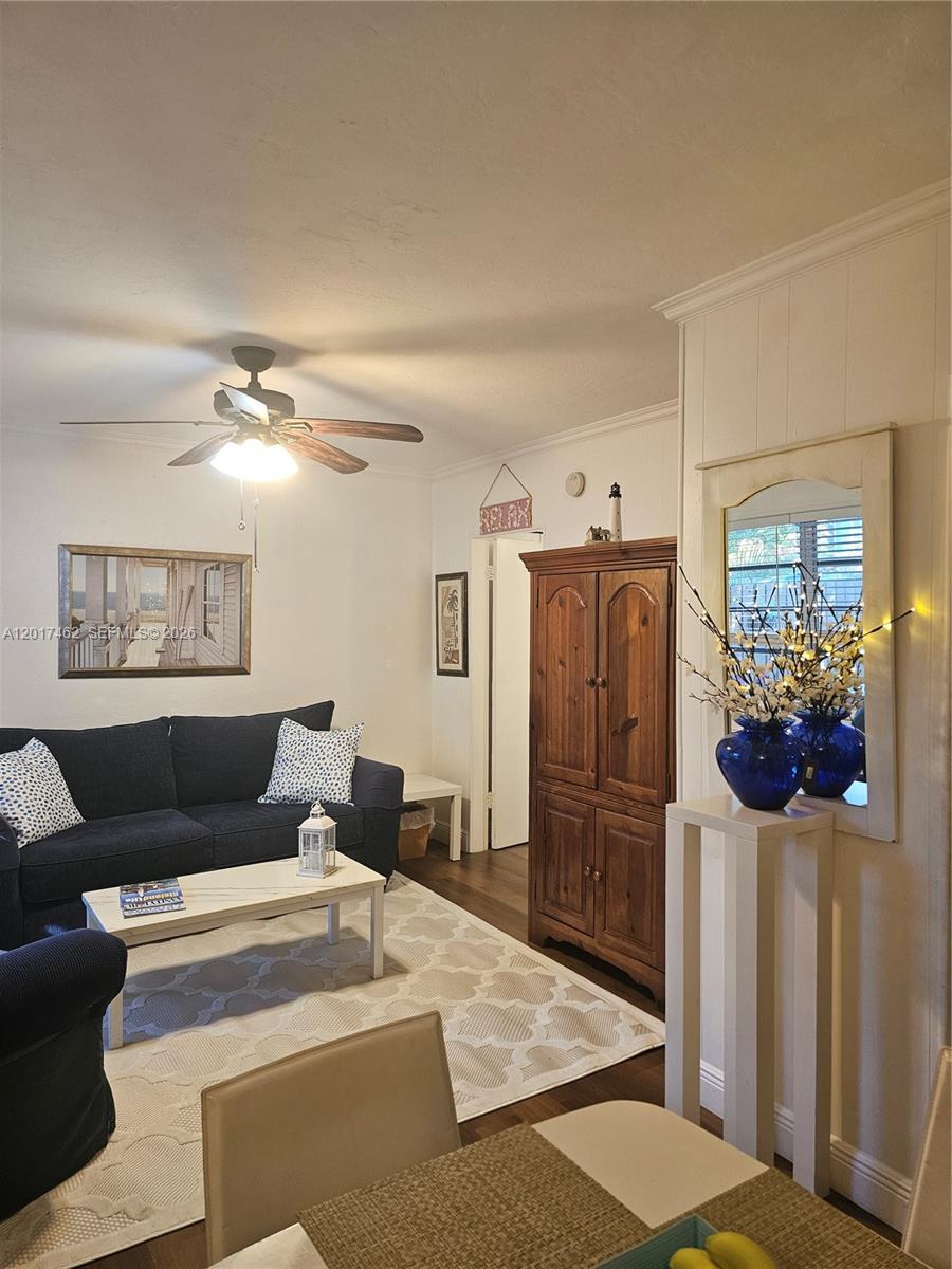 325 Fernwood Road, Unit 10 Key Biscayne, FL 33149 - Photo 9 of 12 a living room with furniture and wooden floor