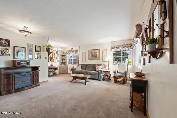 a kitchen with stainless steel appliances granite countertop a refrigerator sink and cabinets