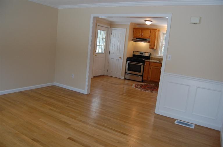 142 Skunknet Road Centerville, MA 02632 - Photo 13 of 35 a view of a room with wooden floor pool table and a kitchen