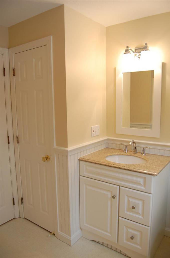 142 Skunknet Road Centerville, MA 02632 - Photo 18 of 35 a bathroom with a granite countertop sink and a mirror