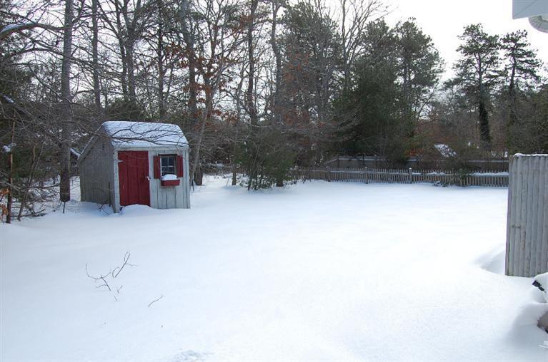 142 Skunknet Road Centerville, MA 02632 - Photo 32 of 35 an outdoor space with seating