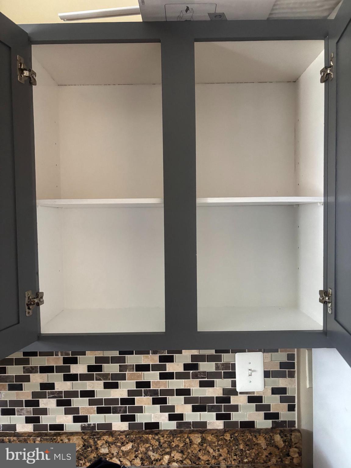 7721 Bender Road Landover, MD 20785 - Photo 15 of 38 Kitechen cabinet inside