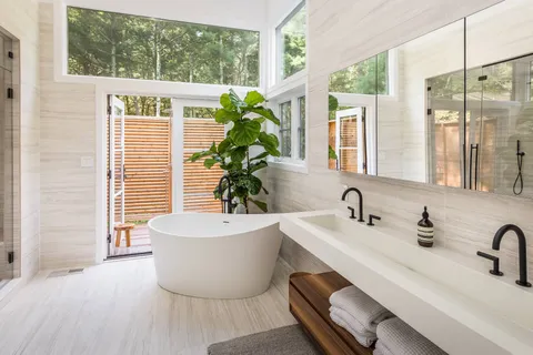 a bathroom with a bathtub and sink