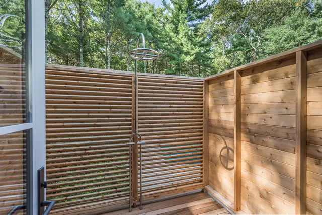 a view of a back yard from a balcony