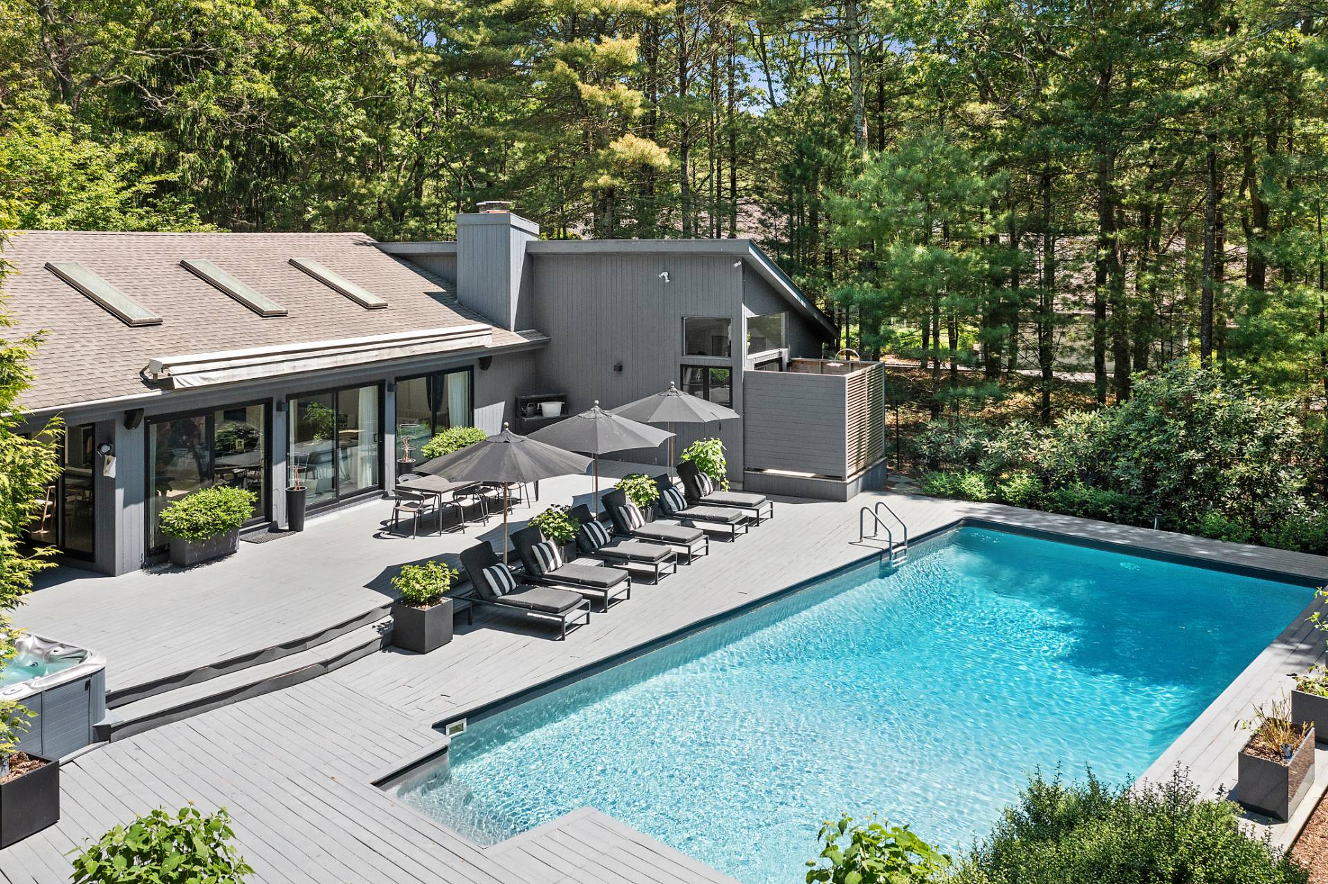 4 Bull Path Close East Hampton, NY 11937 - Photo 2 of 38 a view of a house with backyard sitting area and garden