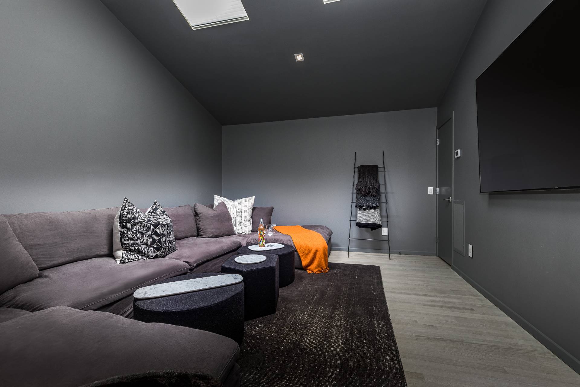 4 Bull Path Close East Hampton, NY 11937 - Photo 23 of 38 a living room with furniture and a flat screen tv
