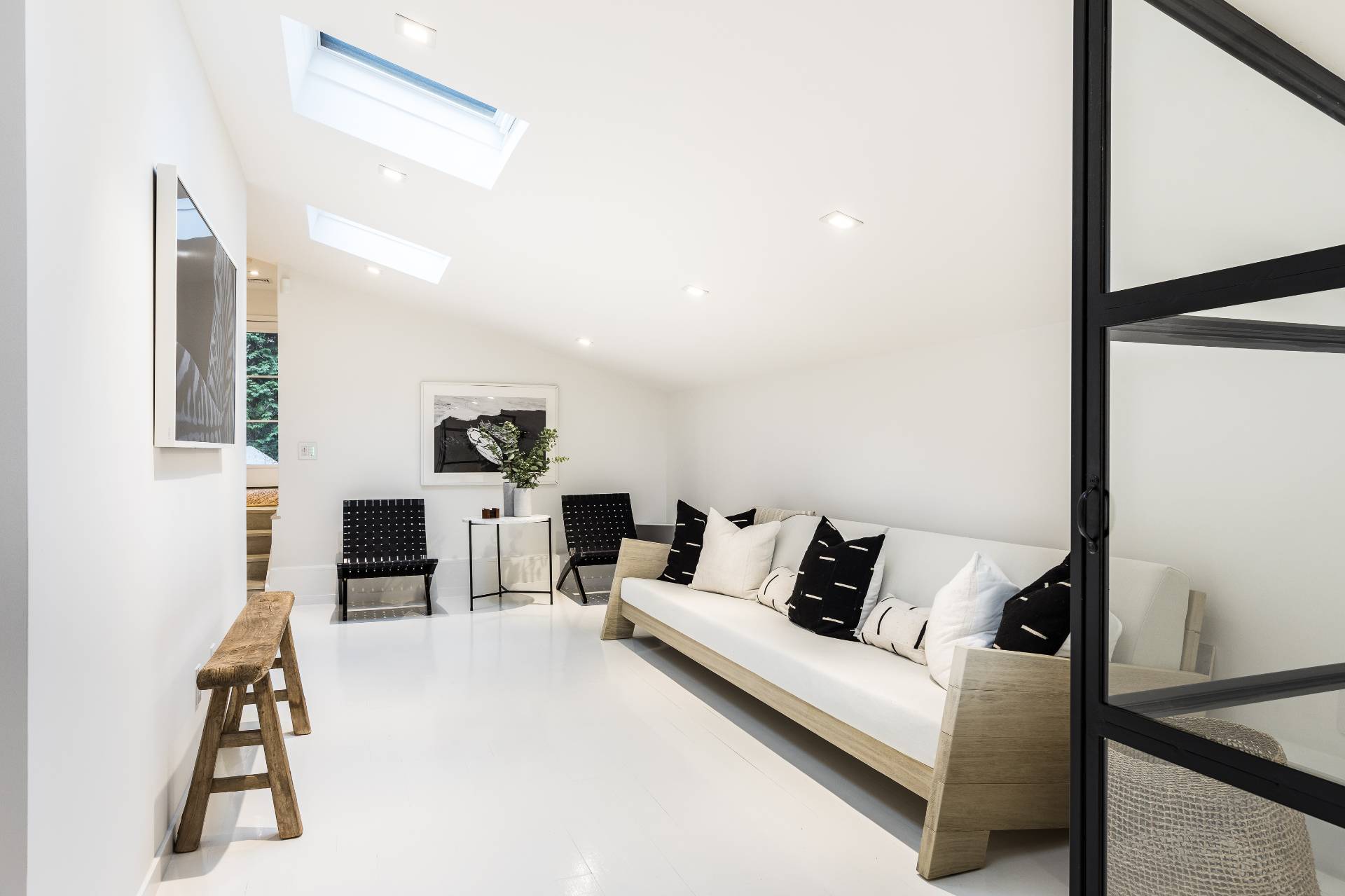 4 Bull Path Close East Hampton, NY 11937 - Photo 26 of 38 a living room with furniture and a flat screen tv