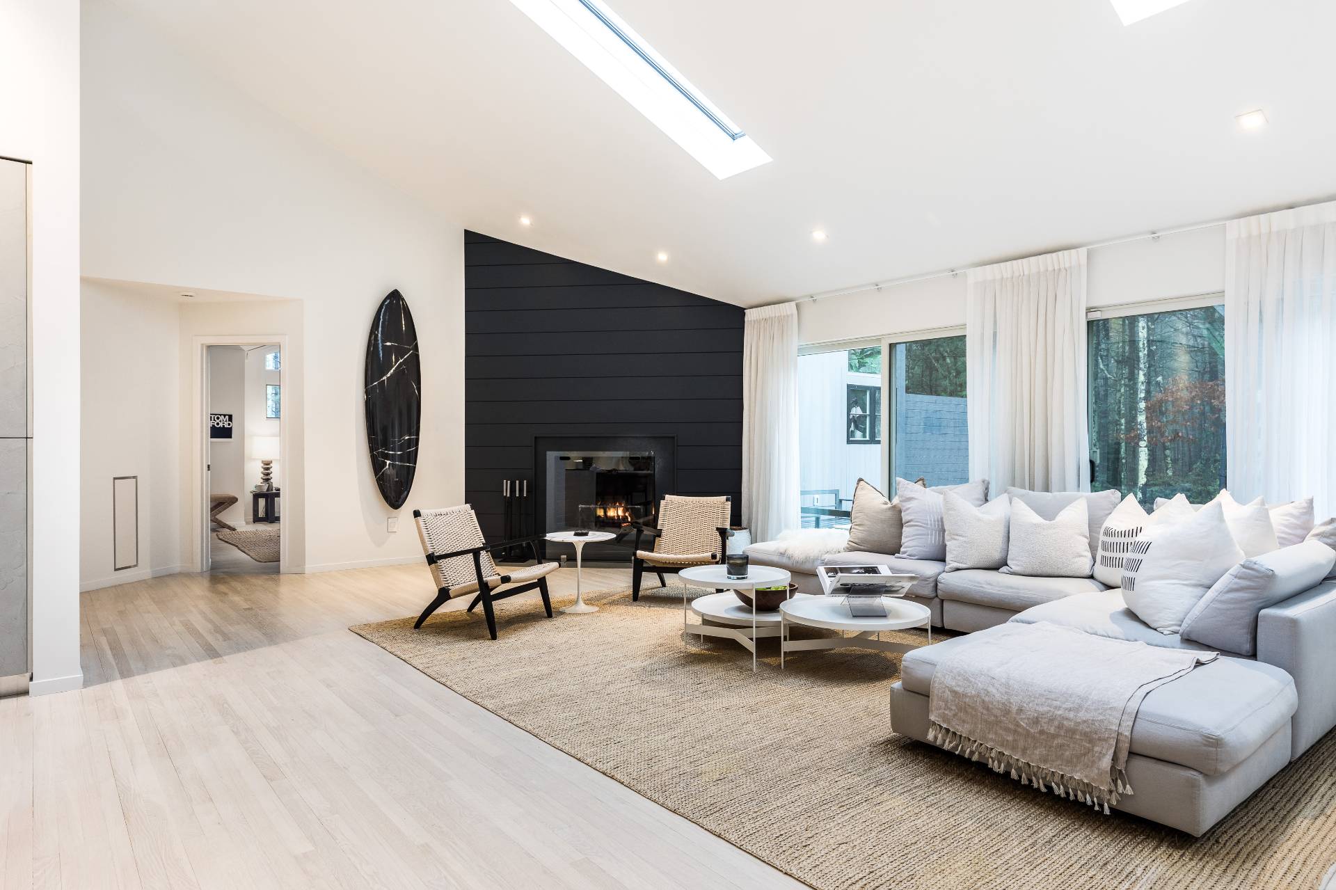 4 Bull Path Close East Hampton, NY 11937 - Photo 8 of 38 a living room with furniture and a fireplace