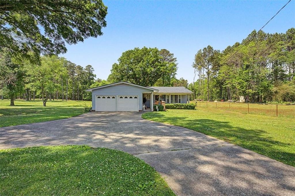 71 North Avery Road Northwest Rome, GA 30165 - Photo 2 of 42 a view of a house with a yard