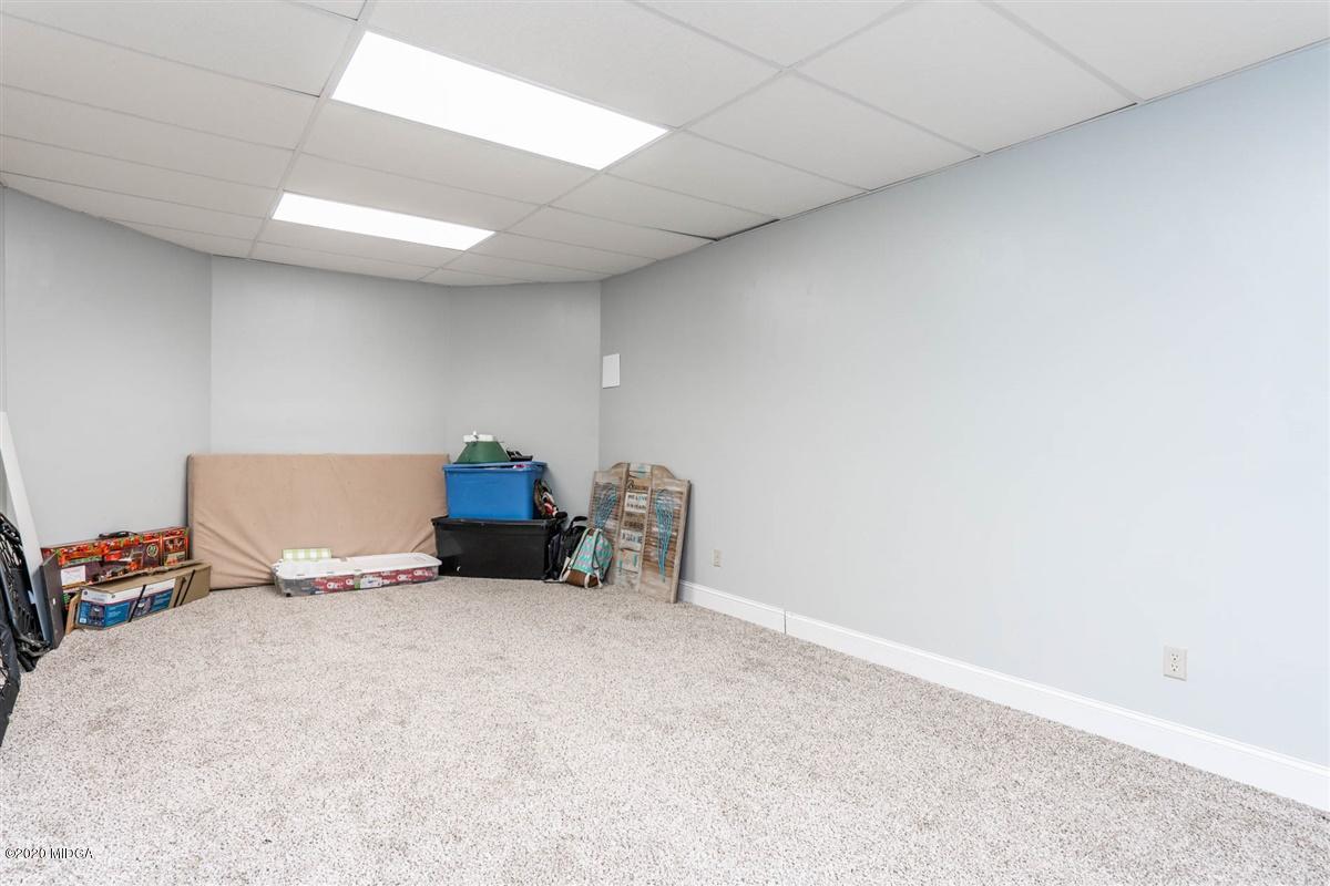 873 Blue Store Road Forsyth, GA 31029 - Photo 20 of 25 a living room with furniture