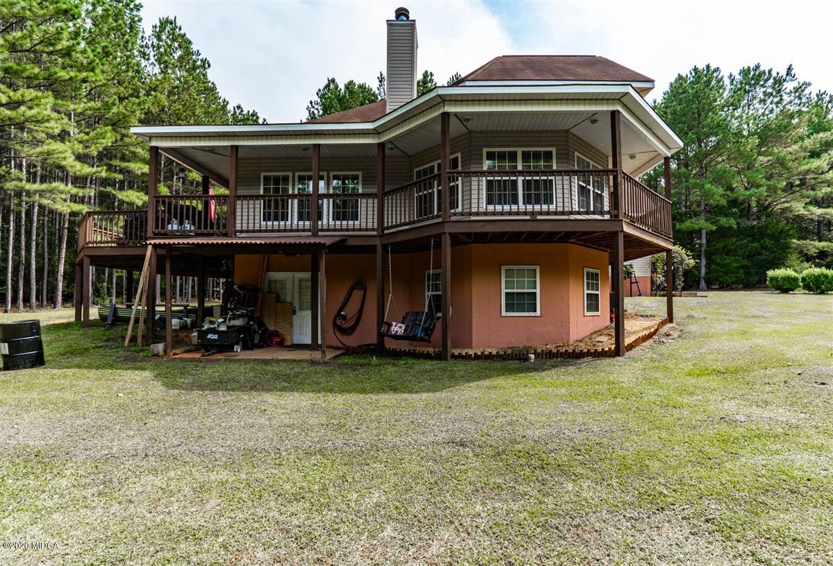 873 Blue Store Road Forsyth, GA 31029 - Photo 24 of 25 front view of a house with a yard