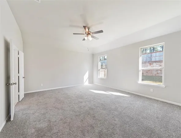 a bathroom with a bathtub a sink and a mirror