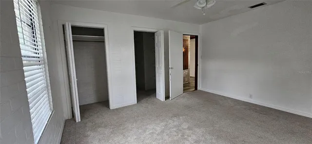 an empty room with windows