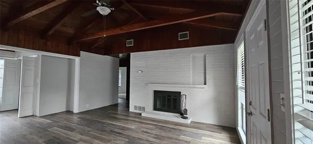 a view of a livingroom with a fireplace