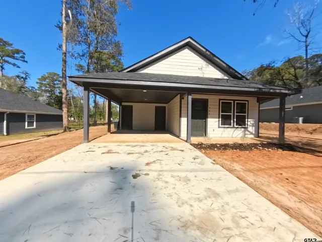 a view of a house with a patio