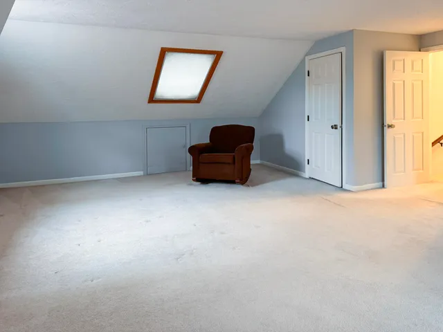 an empty room with window