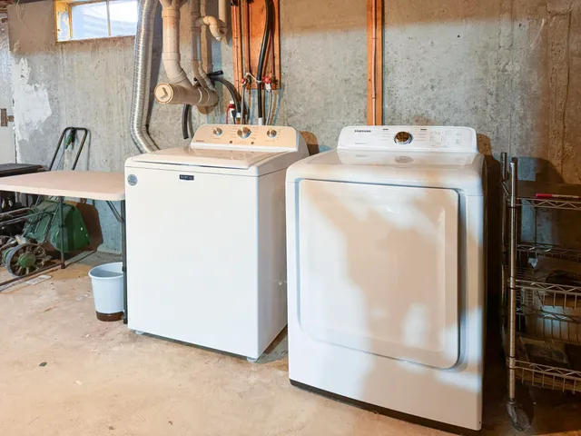 a utility room with dryer and washer