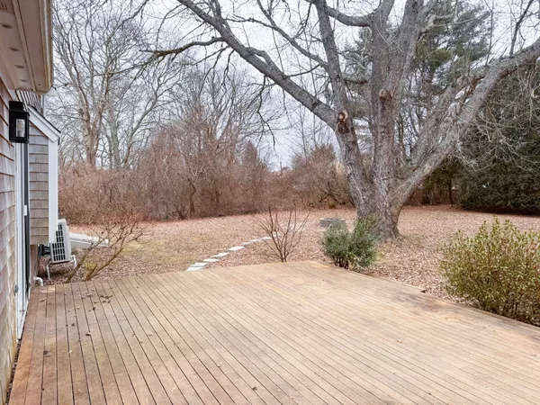 a view of a backyard of the house