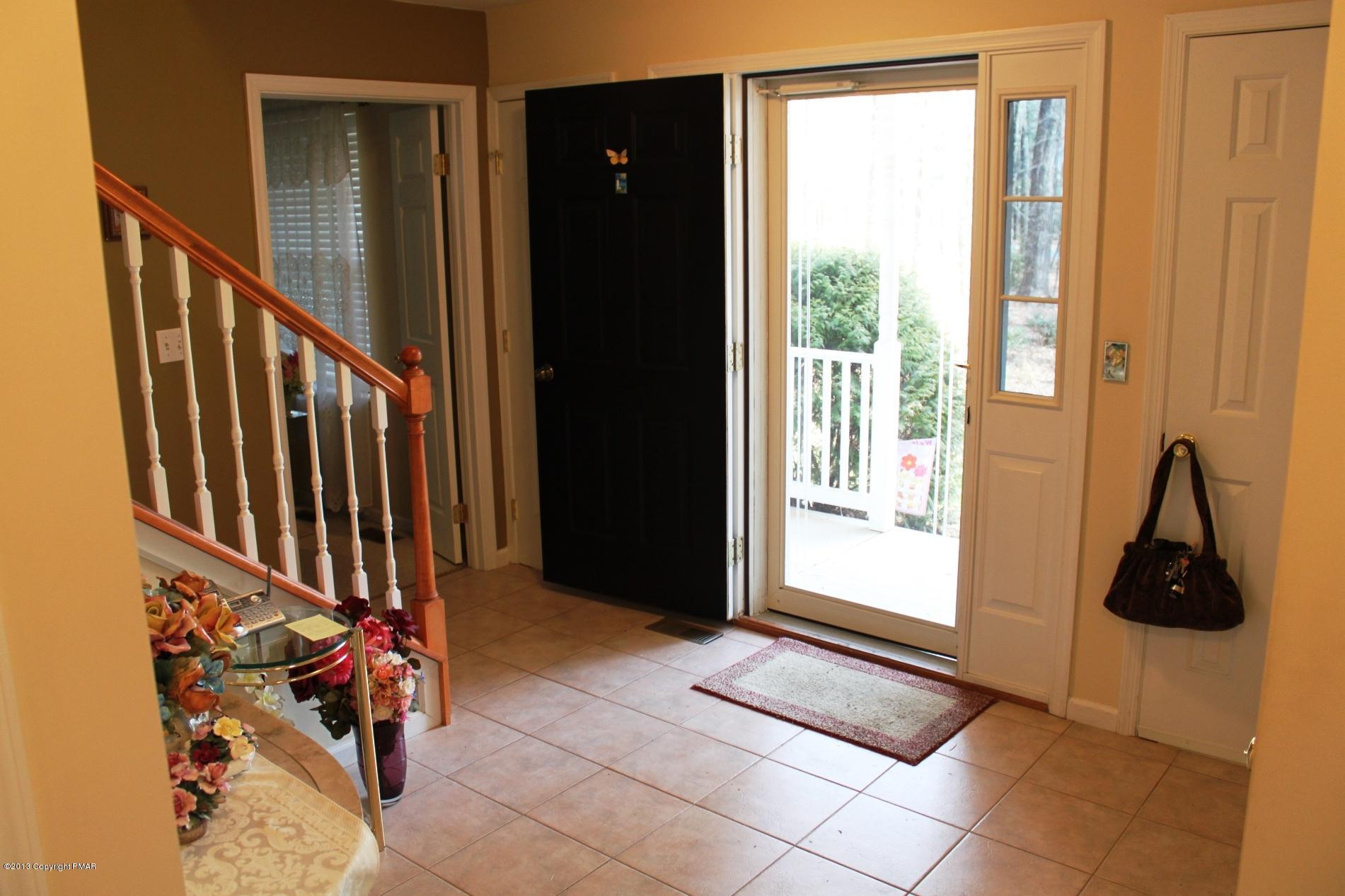 128 Ruth Drive Cresco, PA 18326 - Photo 3 of 28 a view of entryway and hall with wooden floor