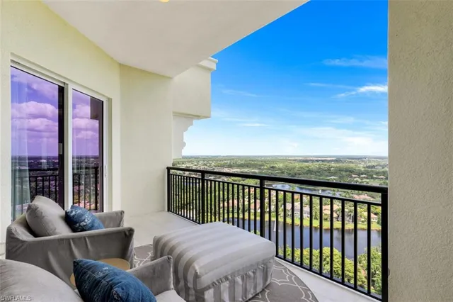 a balcony with furniture