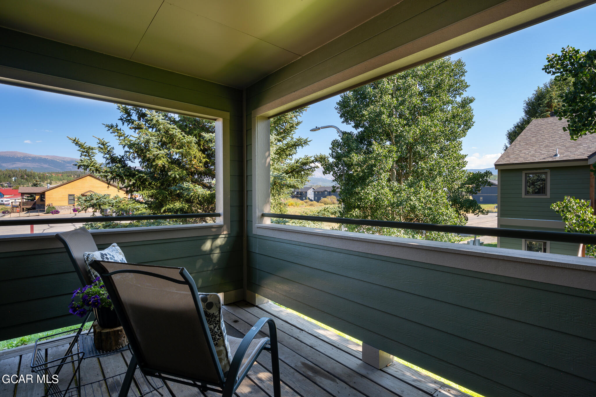 99 Doc Susie Avenue, Unit B6 Fraser, CO 80442 - Photo 14 of 24 a view of a two chair in the balcony