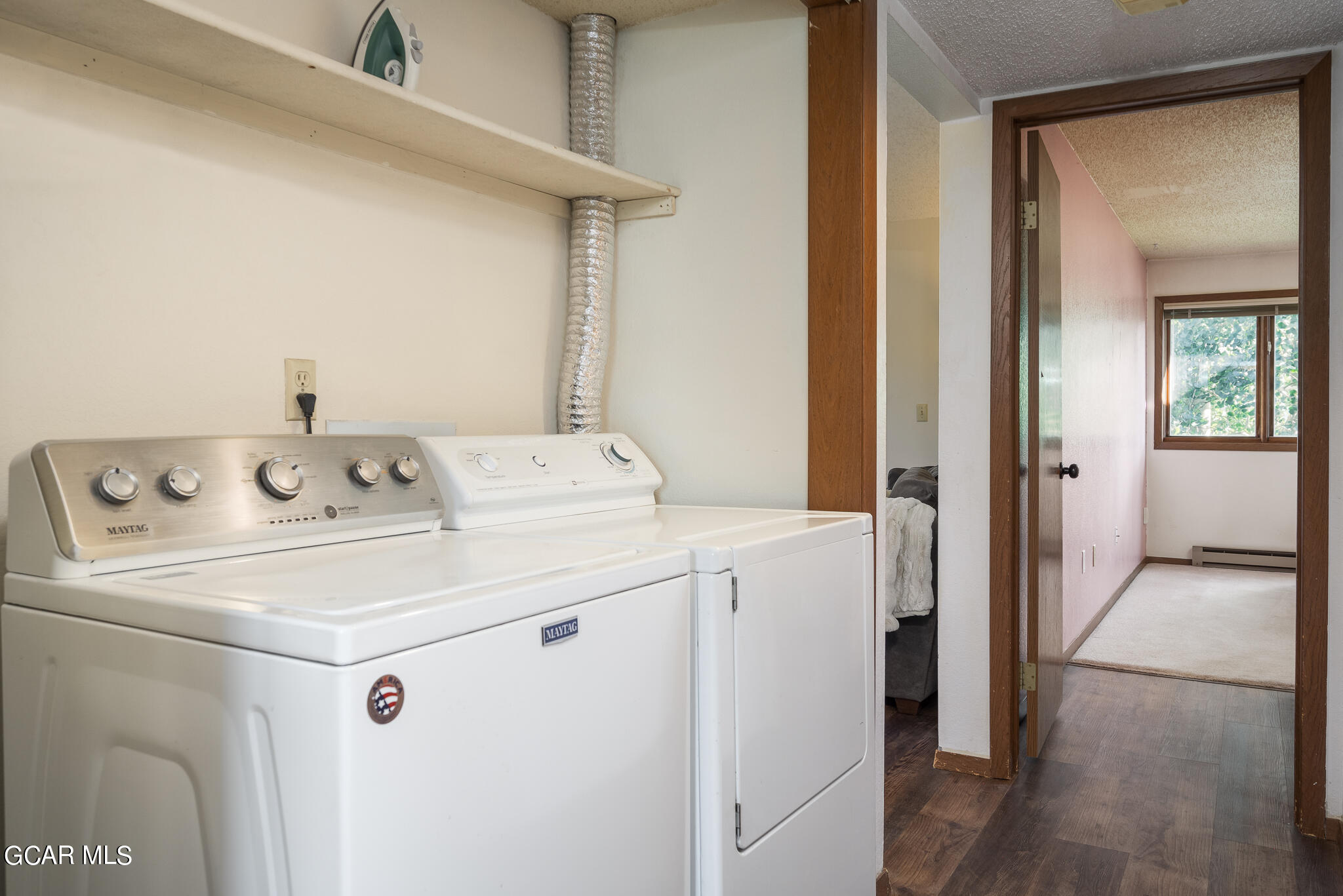 99 Doc Susie Avenue, Unit B6 Fraser, CO 80442 - Photo 18 of 24 a utility room with dryer and washer