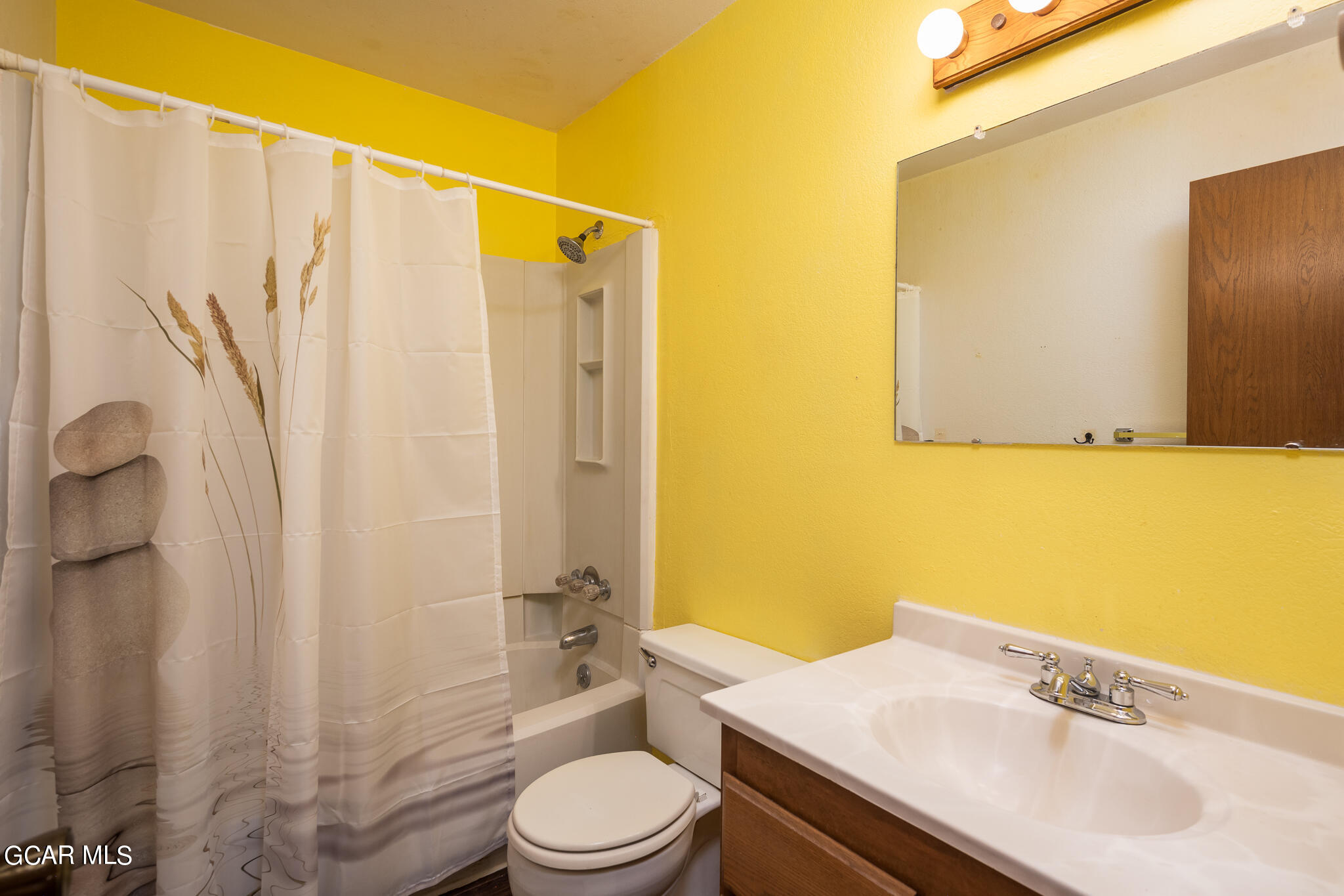 99 Doc Susie Avenue, Unit B6 Fraser, CO 80442 - Photo 21 of 24 a bathroom with a sink a toilet and shower