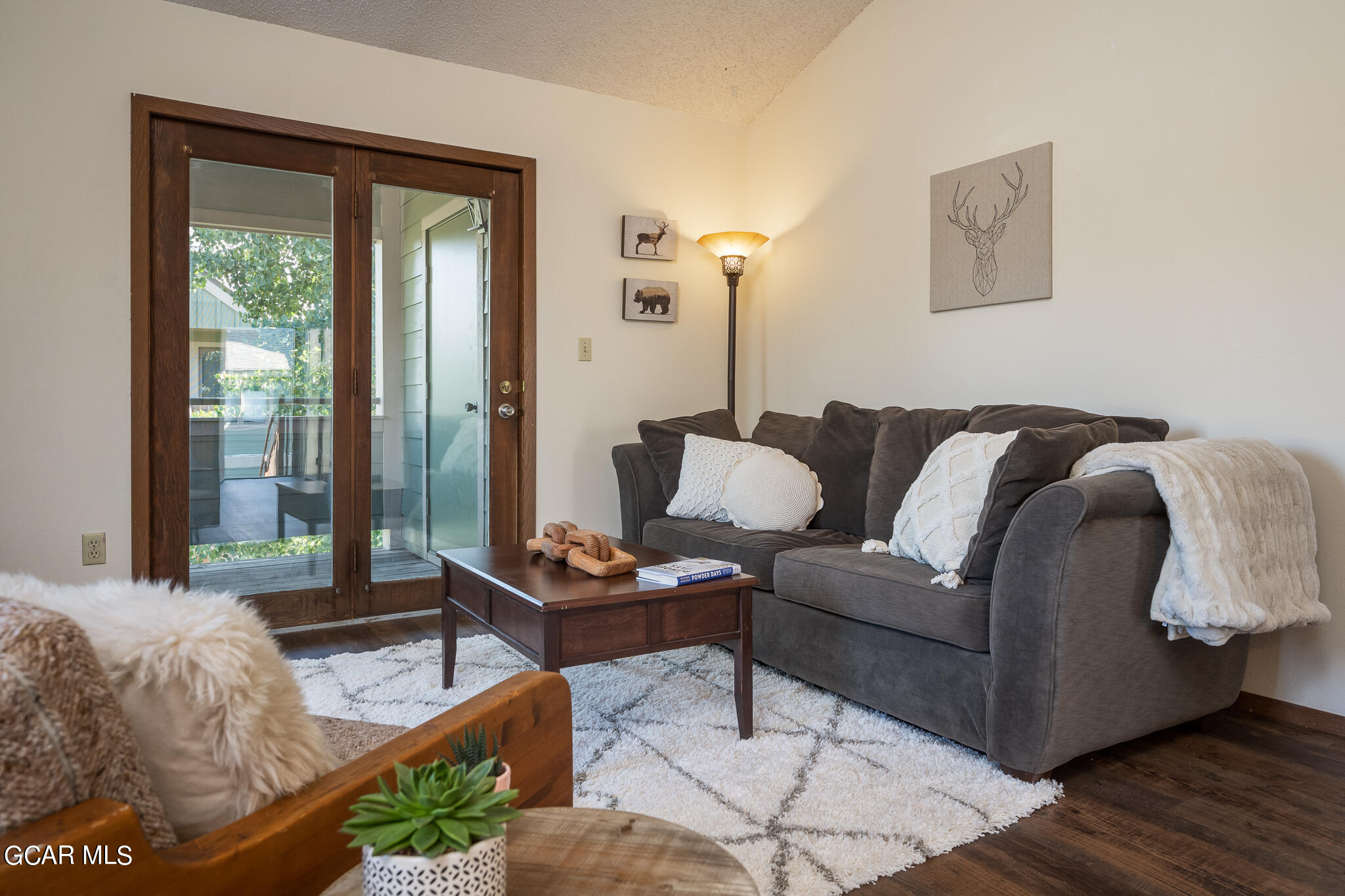 99 Doc Susie Avenue, Unit B6 Fraser, CO 80442 - Photo 9 of 24 a living room with furniture and a window
