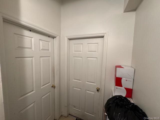 95 Renwick Street Newburgh, NY 12550 - Photo 11 of 24 a bedroom with a bed and a cabinets
