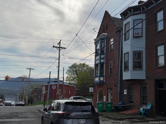 95 Renwick Street Newburgh, NY 12550 - Photo 15 of 24 a view of a street that has couple of cars parked on the road