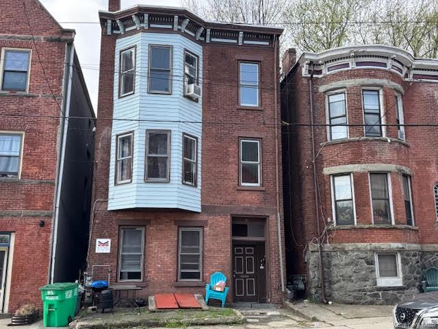 95 Renwick Street Newburgh, NY 12550 - Photo 20 of 24 a front view of a multi story residential apartment building