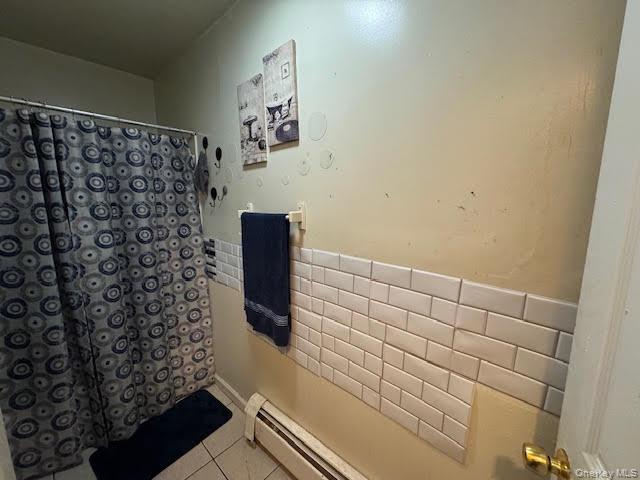 95 Renwick Street Newburgh, NY 12550 - Photo 24 of 24 a bathroom with a shower and a sink