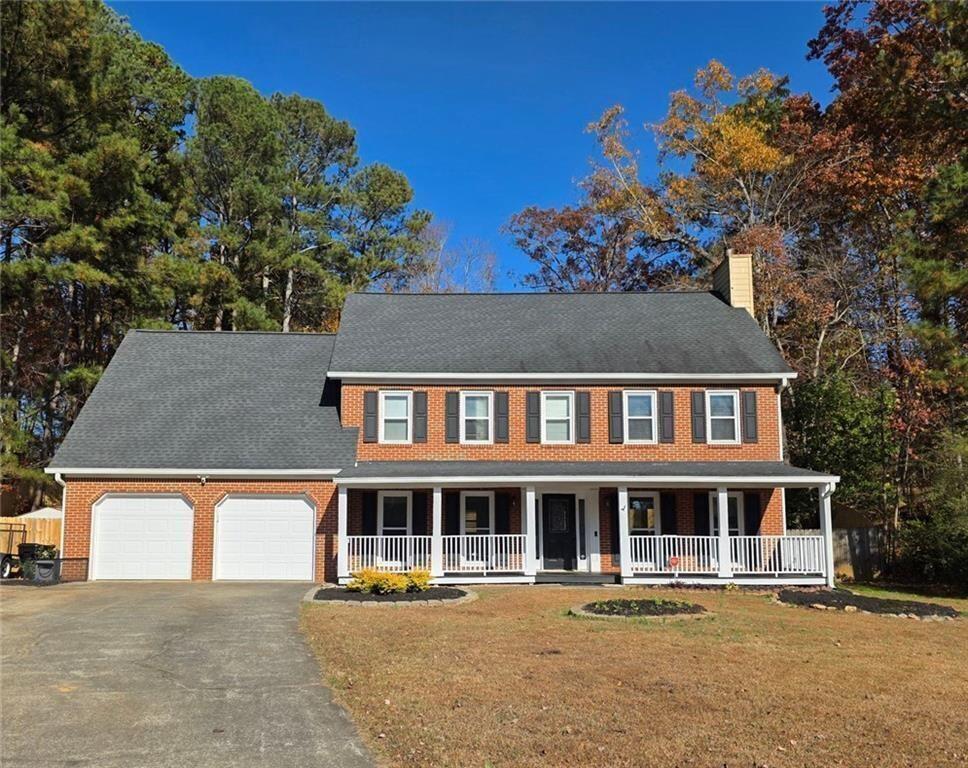 2610 Loring Road Northwest Kennesaw, GA 30152 - Photo 1 of 28 front view of a house with a view of a house