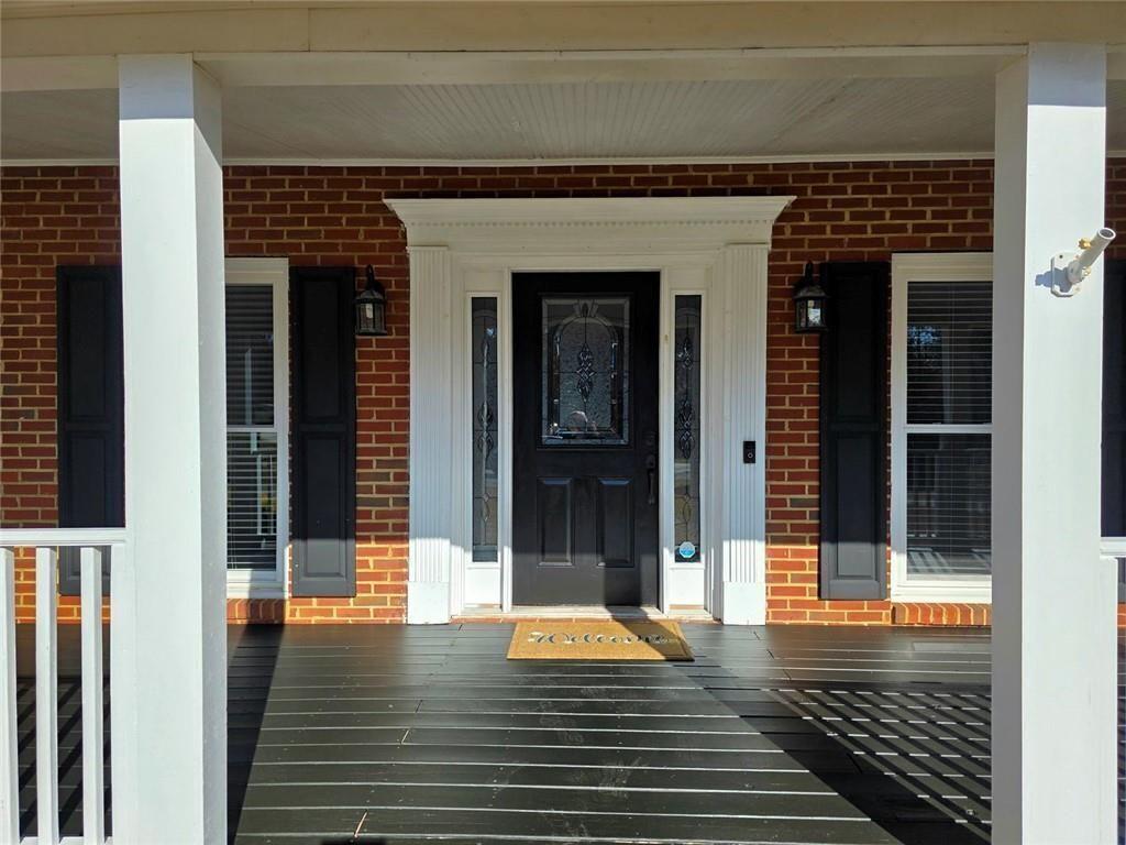 2610 Loring Road Northwest Kennesaw, GA 30152 - Photo 2 of 28 a view of a entryway door with an outdoor space