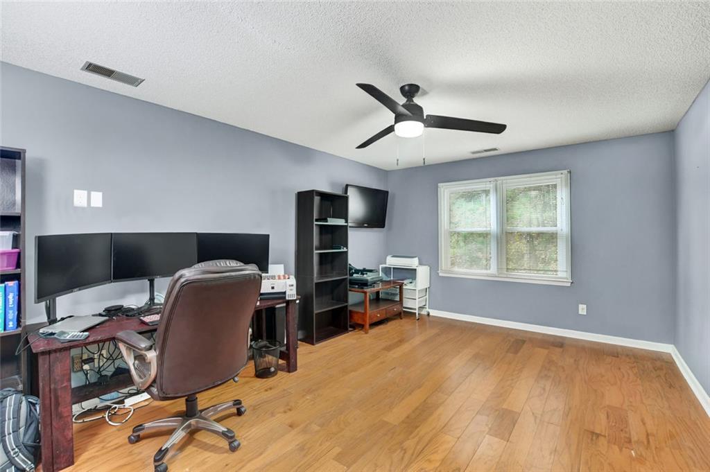 2610 Loring Road Northwest Kennesaw, GA 30152 - Photo 22 of 28 a workspace with furniture hardwood and a workspace