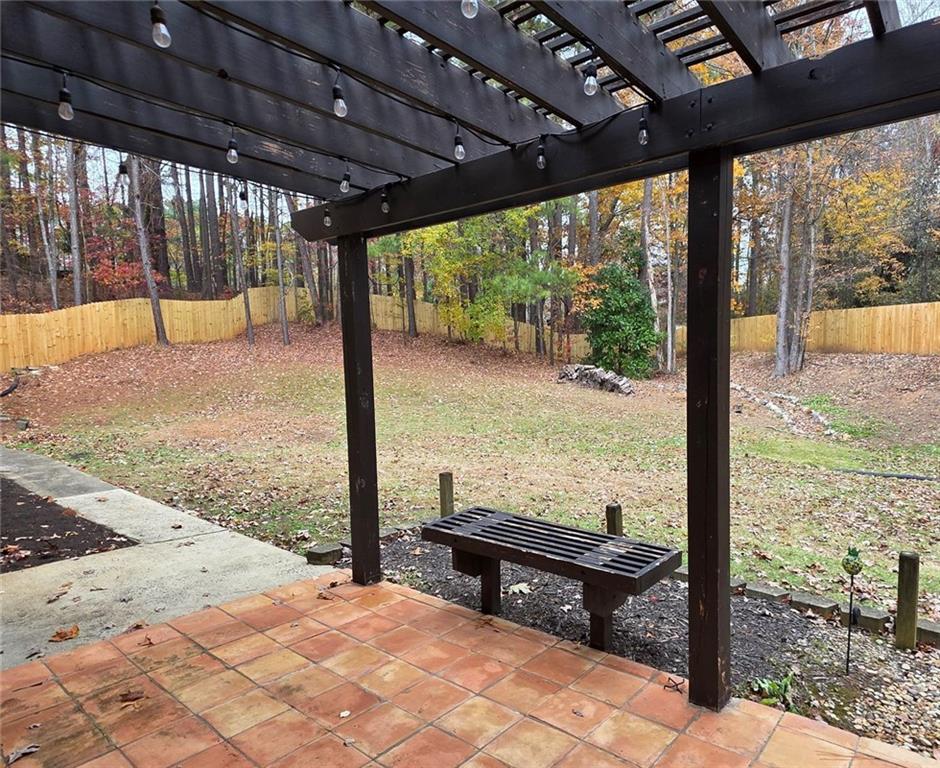 2610 Loring Road Northwest Kennesaw, GA 30152 - Photo 23 of 28 a view of a outdoor space with a big yard