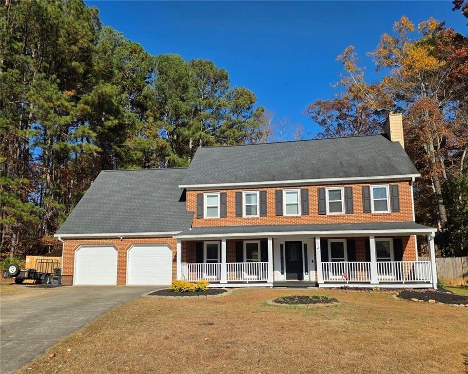 2610 Loring Road Northwest Kennesaw, GA 30152 - Photo 26 of 28 front view of a house with a view of a house