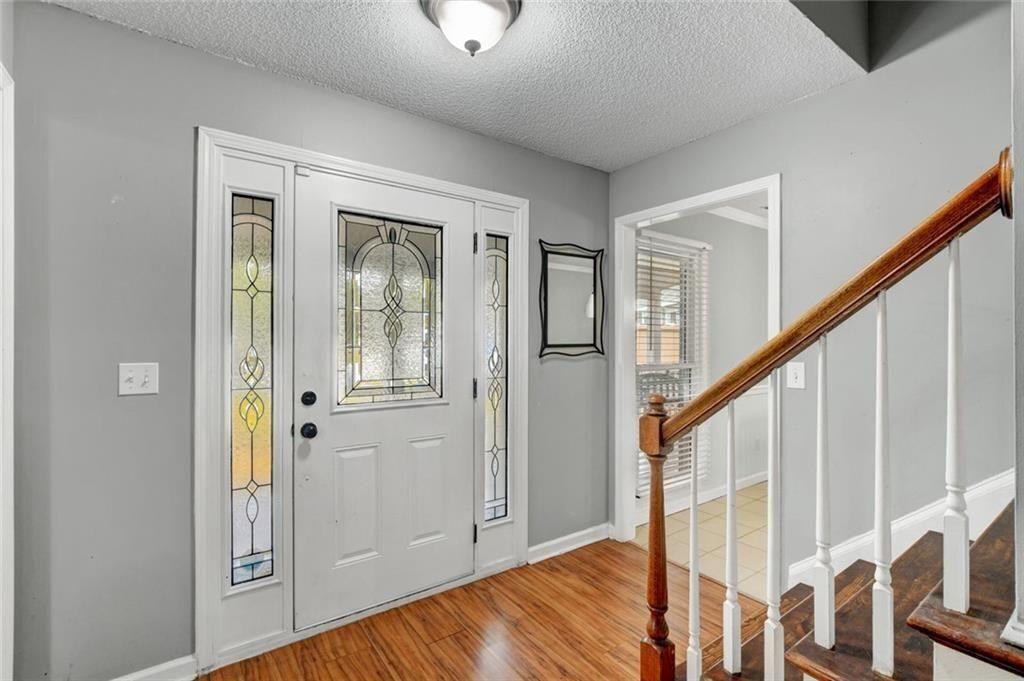 2610 Loring Road Northwest Kennesaw, GA 30152 - Photo 4 of 28 a view of an entryway with wooden floor