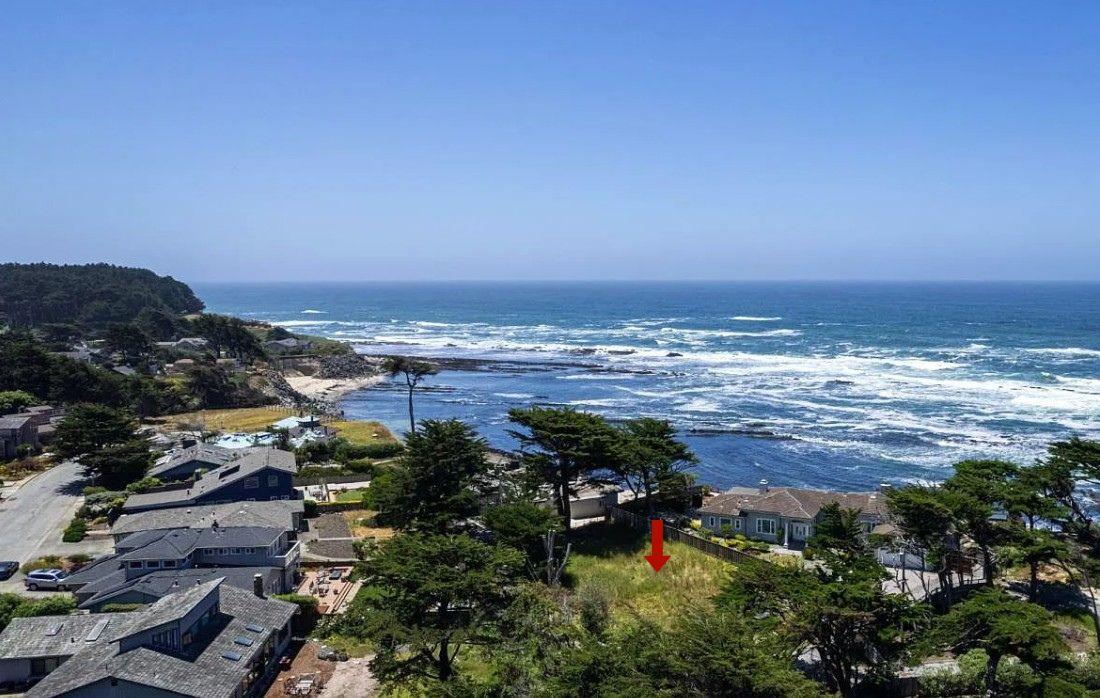 155 Reef Point Road Moss Beach, CA 94038 - Photo 4 of 9 an aerial view of ocean and residential houses with outdoor space