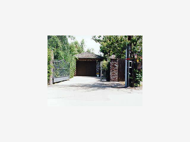 a view of a garden from a porch
